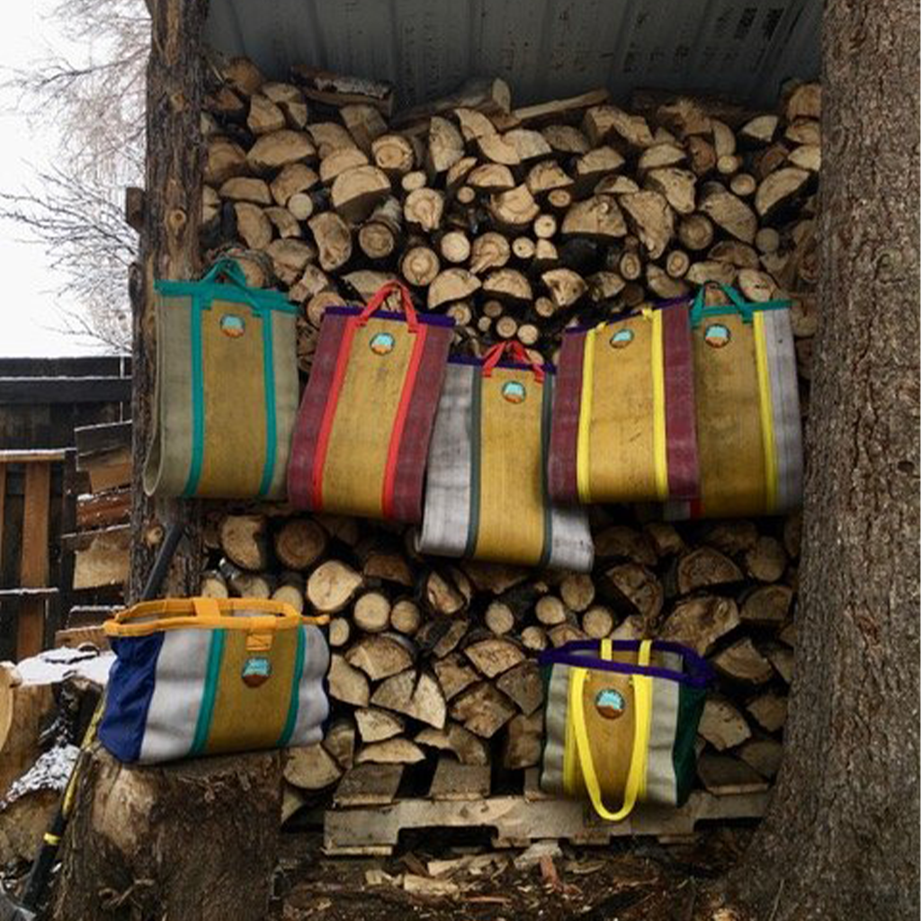 Repurposed Fire Hose Log Carrier