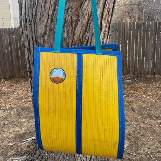 Repurposed Fire Hose Log Carrier