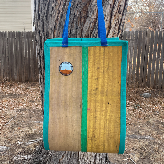 Repurposed Fire Hose Log Carrier